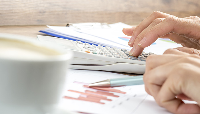 Female doing some accounts calculations