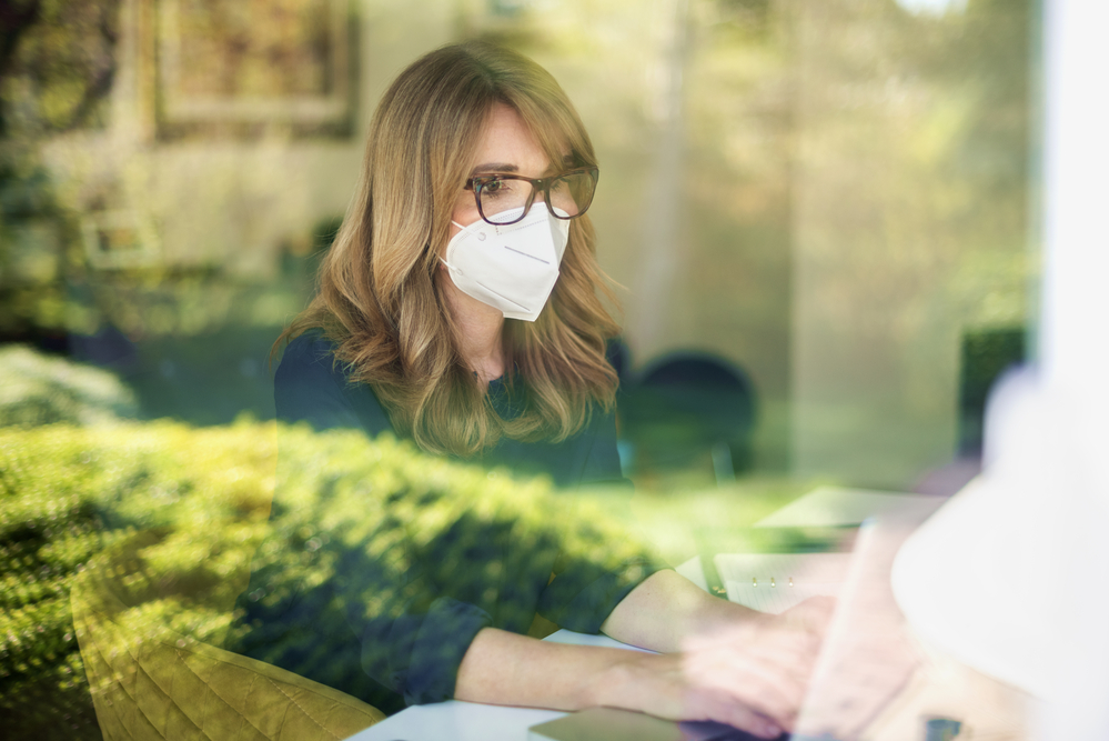 Female-business owner working during Covid-19 pandemic